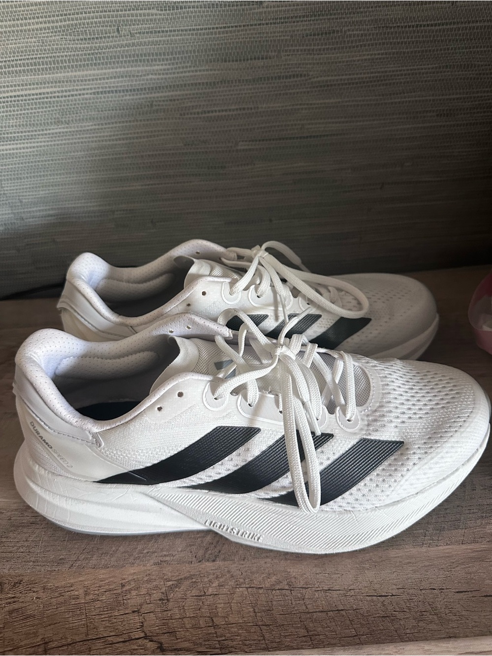 adidas White Athletic Running Shoes with Black Stripes